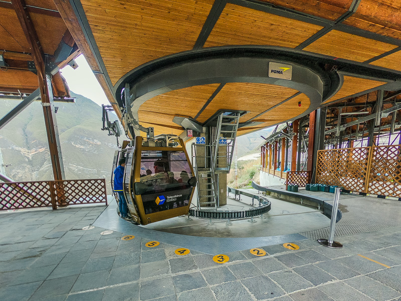 Cable car cabin coming in at the station