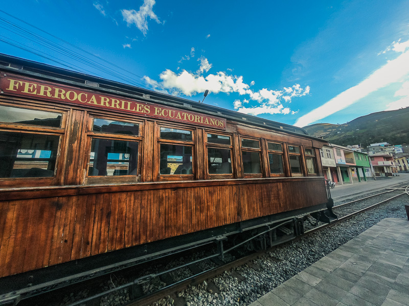 Wooden train carriage at the town station in Alausi