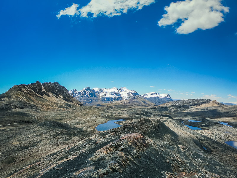 Wandering off the trail to catch a view of the mountain range