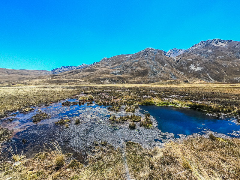 Small pond and mountain range from the viewpoint