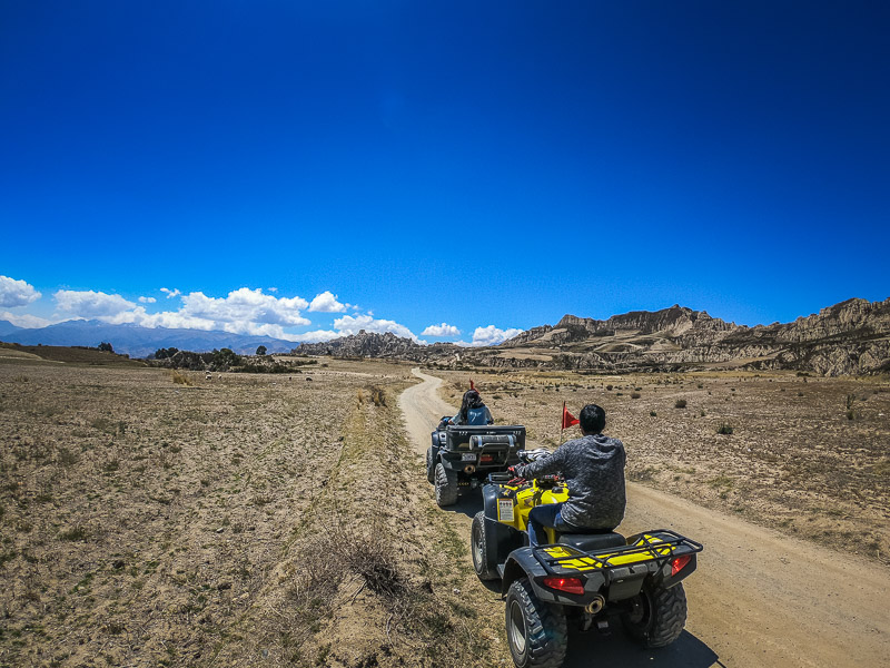 Second stop at the plain with moon-like mountain terrains in the background