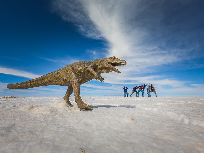 Perspective photo with the toy dinosaur on the salt flats