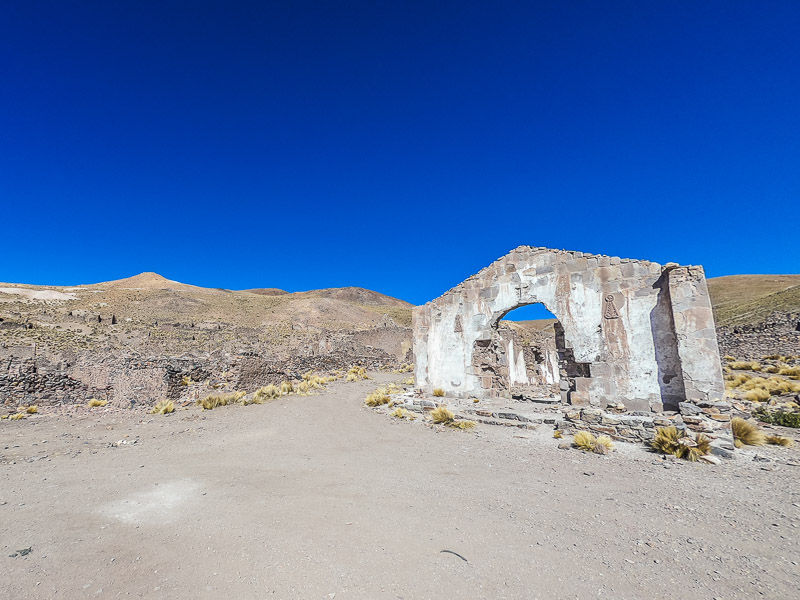 Site of an abandoned town with decaying buildings