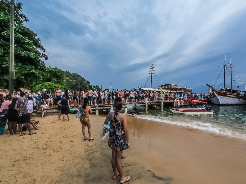 Queuing up to get back on the boat after torrential rain