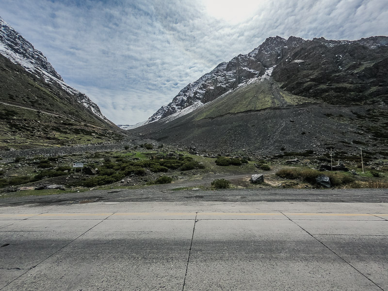 Climbing the meandering roads of the Andes to the Chilean customs border control point