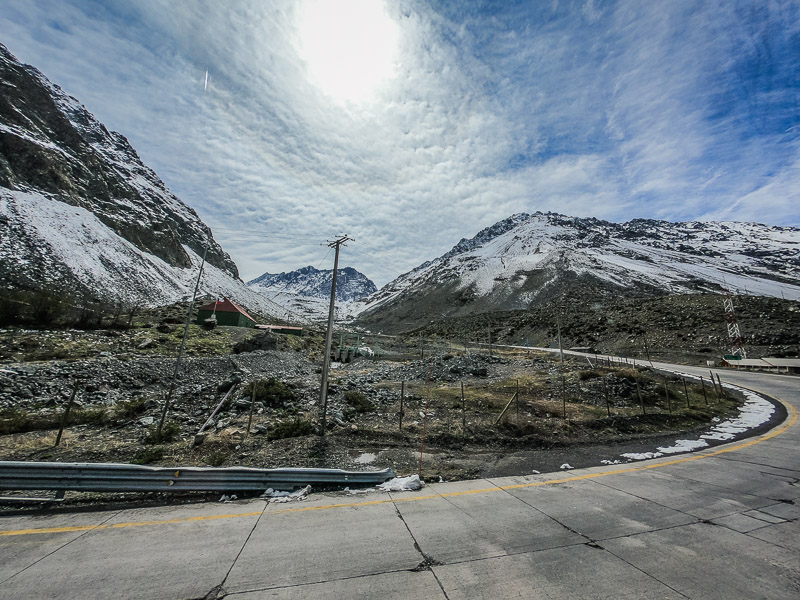 Climbing the meandering roads of the Andes to the Chilean customs border control point