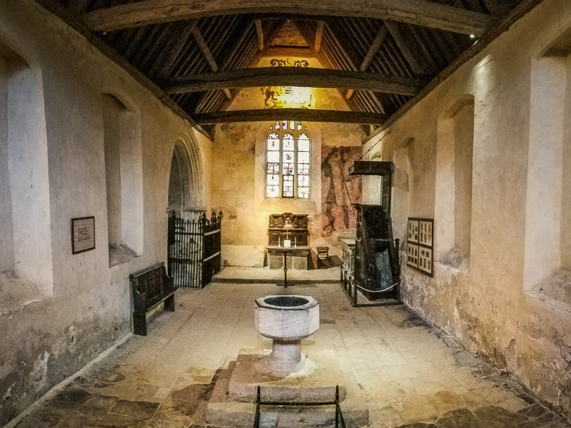 Inside the chapel with the faint medieval painted wall