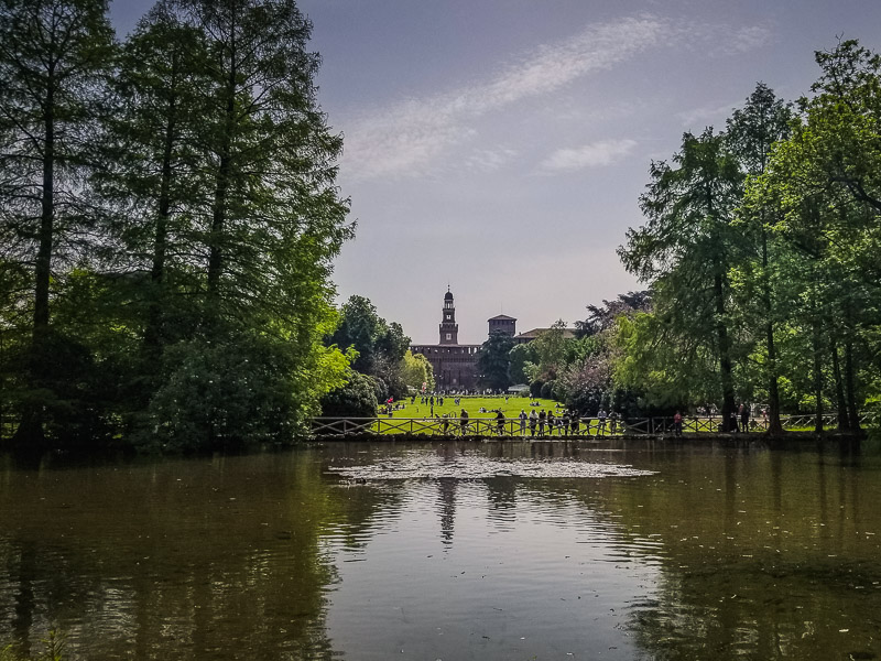 Lake in park Sempione with castle Sforzesco in the background