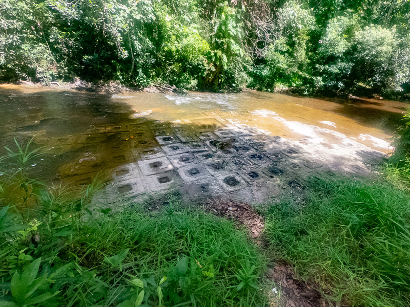 Tiles carved into the stream's bedrock