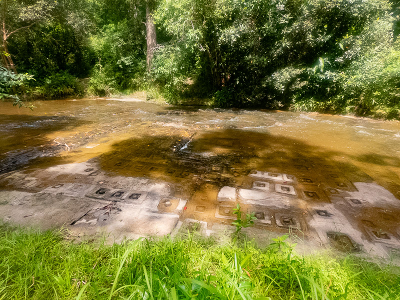 Tiles carved into the stream's bedrock