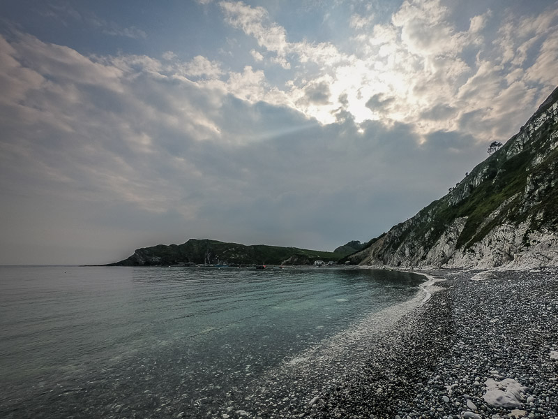 Walking along the stone beach