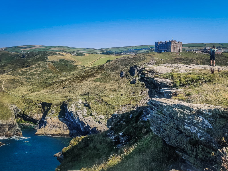 View of the beach and hilly landscape from the headland island