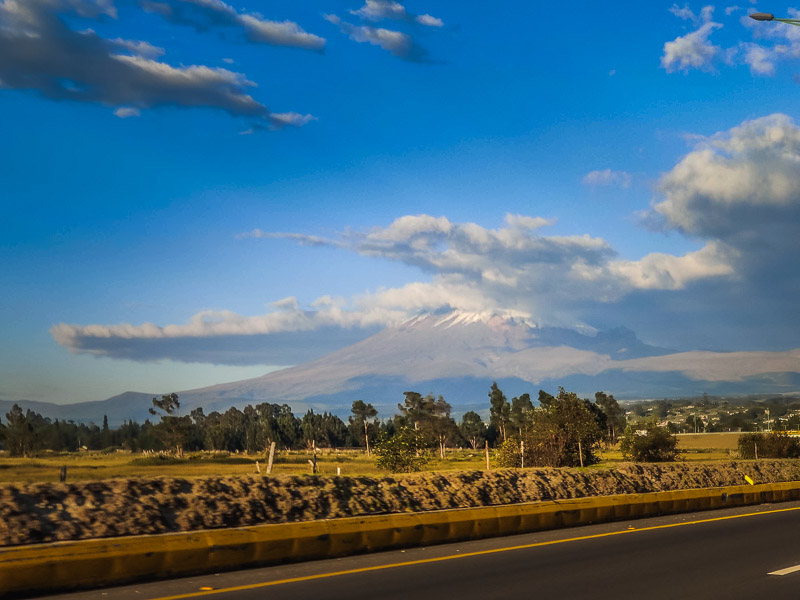 View of the snow-topped volcano from the highway