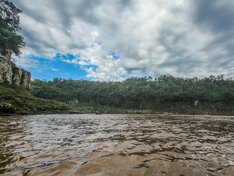 Looking at another speedboat coming up from downstream