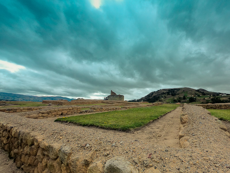 Inca and Cañari ruins with Templo del Sol in the background