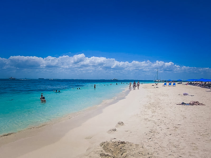 Sandy beach with clear blue waters