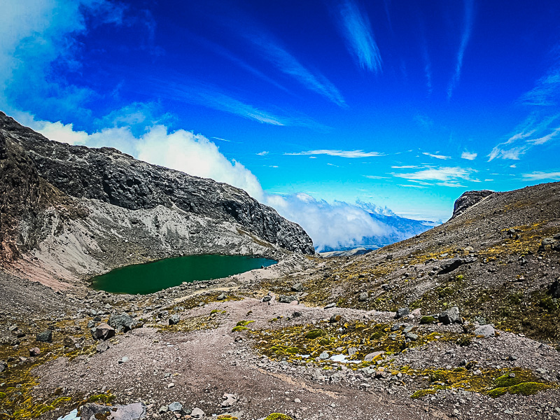 Approaching a small lake between the peaks