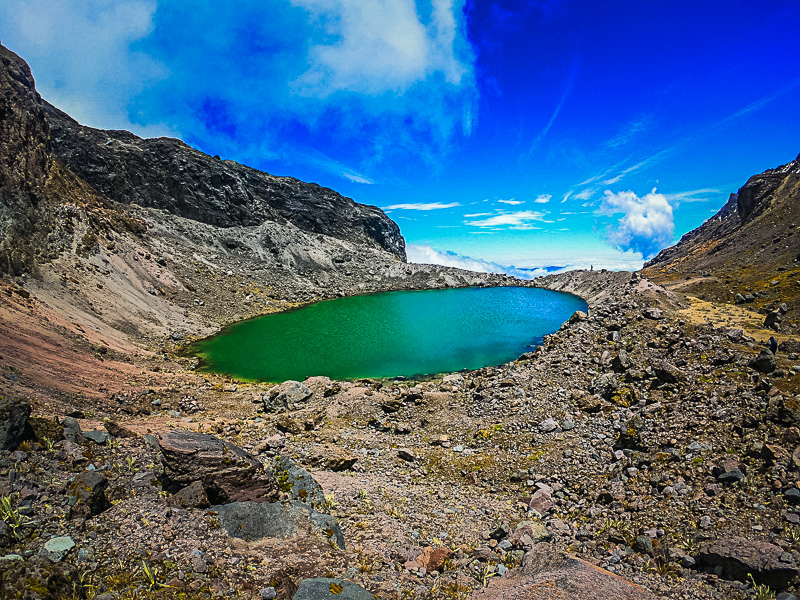 Approaching a small lake between the peaks