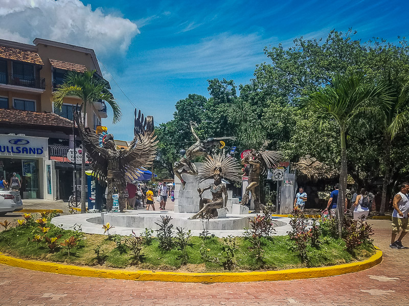 A roundabout decorated with indigenous statues