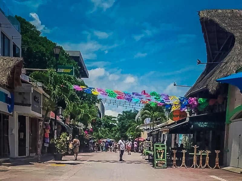 The main strip with shops, bars, and restaurants