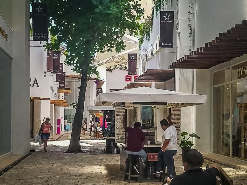 A plaza with more upscale shops