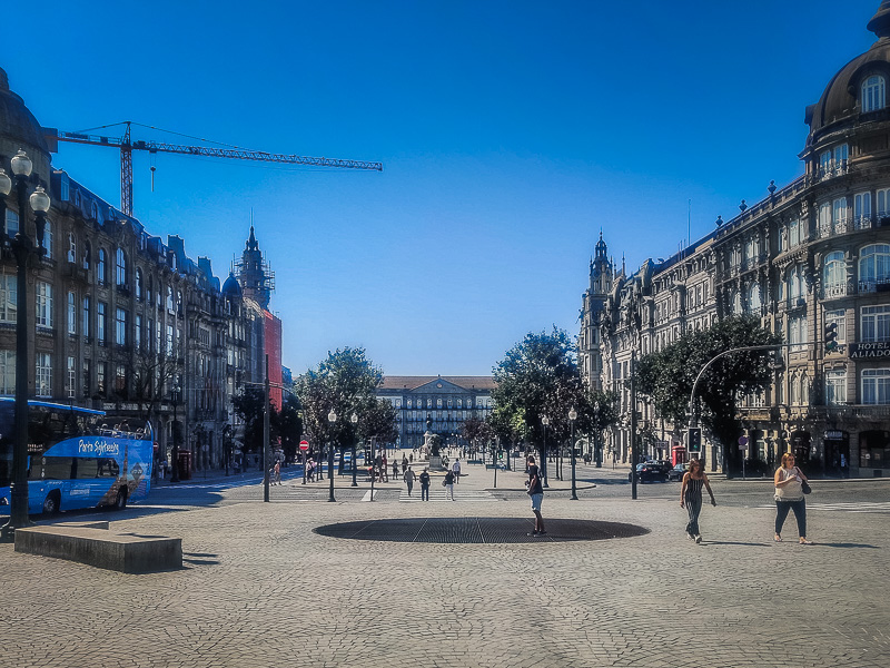 Walking through the main square at Câmara Municipal do Porto