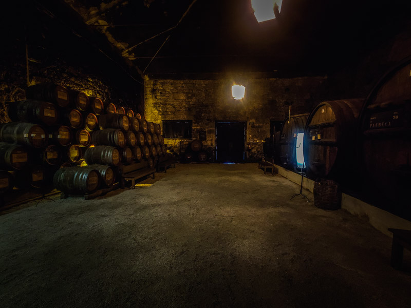 The storage room with different size barrels to age the wines