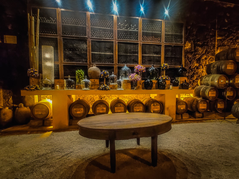 Several aged bottled wines in the storage room