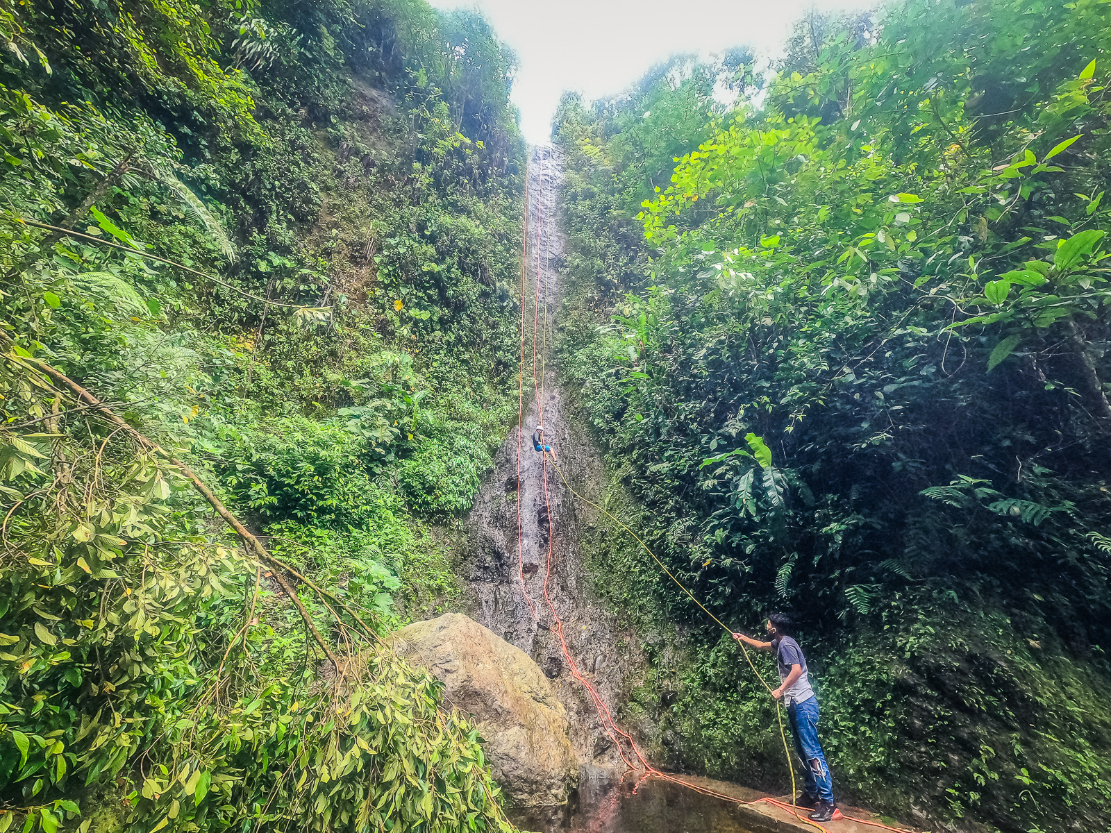 Rapelling down the waterfall