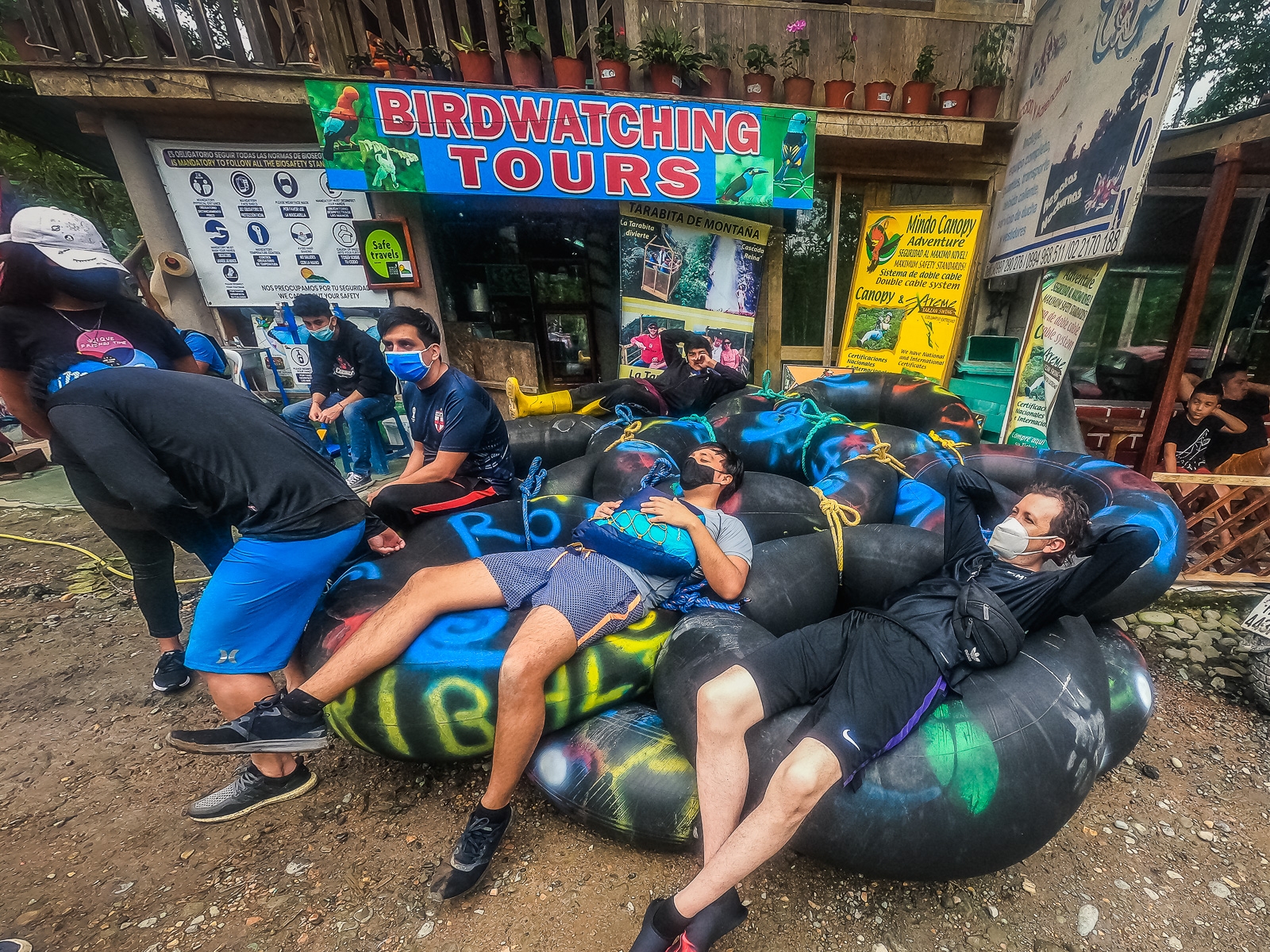 Sitting on the tubes at the tour agency